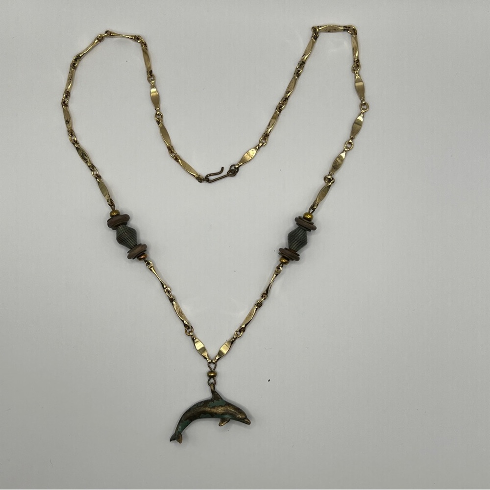 Dolphin necklace patina gold